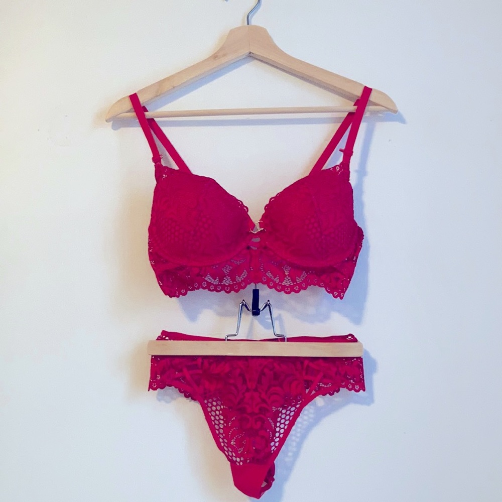 Matching set red lace bra and panty. Bra 36C. Bottoms high waisted size small.